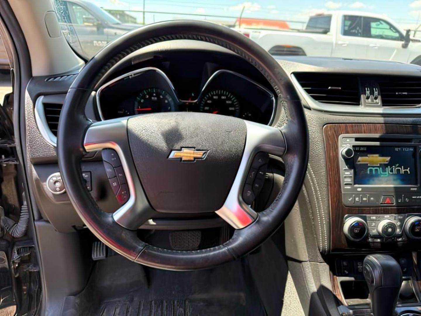 2016 Mosaic Black Metallic /Ebony Chevrolet Traverse LTZ (1GNKVJKD9GJ) with an 3.6L V-6 gasoline direct injection engine, AUTOMATIC transmission, located at 1235 N Woodruff Ave., Idaho Falls, 83401, (208) 523-1053, 43.507172, -112.000488 - At Timberline Auto, finding a great deal on your next vehicle is always easy! Our experienced sales staff's goal is to help find you the right vehicle at the right price! Our knowledgeable finance department has options for almost any credit score. We offer extended service contract options to prote - Photo#14