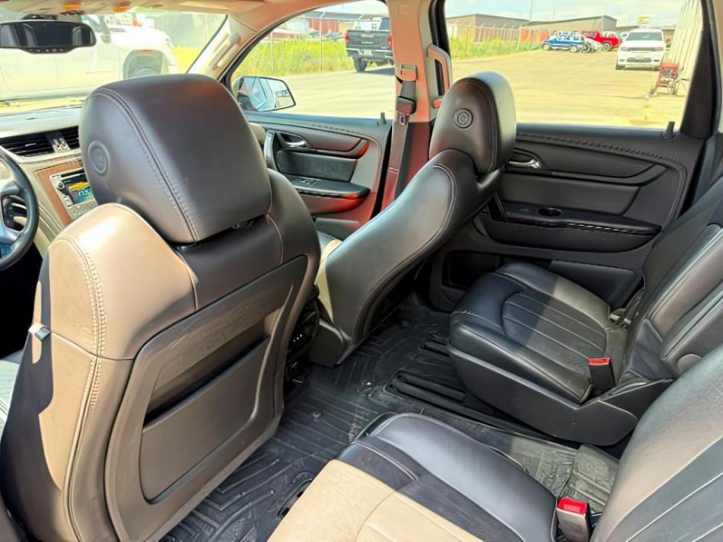 2016 Mosaic Black Metallic /Ebony Chevrolet Traverse LTZ (1GNKVJKD9GJ) with an 3.6L V-6 gasoline direct injection engine, AUTOMATIC transmission, located at 1235 N Woodruff Ave., Idaho Falls, 83401, (208) 523-1053, 43.507172, -112.000488 - At Timberline Auto, finding a great deal on your next vehicle is always easy! Our experienced sales staff's goal is to help find you the right vehicle at the right price! Our knowledgeable finance department has options for almost any credit score. We offer extended service contract options to prote - Photo#23