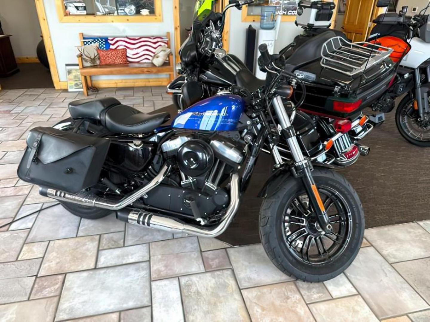 2019 BLUE Harley-Davidson Forty-Eight SPORTSTER (1HD1LC315KC) , AUTOMATIC transmission, located at 1235 N Woodruff Ave., Idaho Falls, 83401, (208) 523-1053, 43.507172, -112.000488 - At Timberline Auto, finding a great deal on your next vehicle is always easy! Our experienced sales staff's goal is to help find you the right vehicle at the right price! Our knowledgeable finance department has options for almost any credit score. We offer extended service contract options to prote - Photo#0