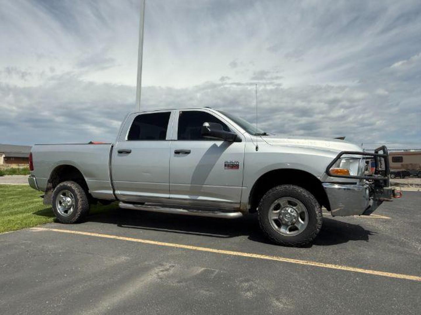 2011 SILVER /CLOTH Ram 2500 ST (3D7TT2CT7BG) with an 5.7 engine, AUTOMATIC transmission, located at 1235 N Woodruff Ave., Idaho Falls, 83401, (208) 523-1053, 43.507172, -112.000488 - At Timberline Auto, finding a great deal on your next vehicle is always easy! Our experienced sales staff's goal is to help find you the right vehicle at the right price! Our knowledgeable finance department has options for almost any credit score. We offer extended service contract options to prote - Photo#2
