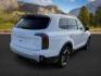 2024 Glacial White Pearl /Black Kia Telluride EX (5XYP3DGCXRG) with an LAMBDA II 3.8L V-6 gasoline direct injection engine, AUTOMATIC transmission, located at 1235 N Woodruff Ave., Idaho Falls, 83401, (208) 523-1053, 43.507172, -112.000488 - At Timberline Auto, finding a great deal on your next vehicle is always easy! Our experienced sales staff's goal is to help find you the right vehicle at the right price! Our knowledgeable finance department has options for almost any credit score. We offer extended service contract options to prote - Photo#7