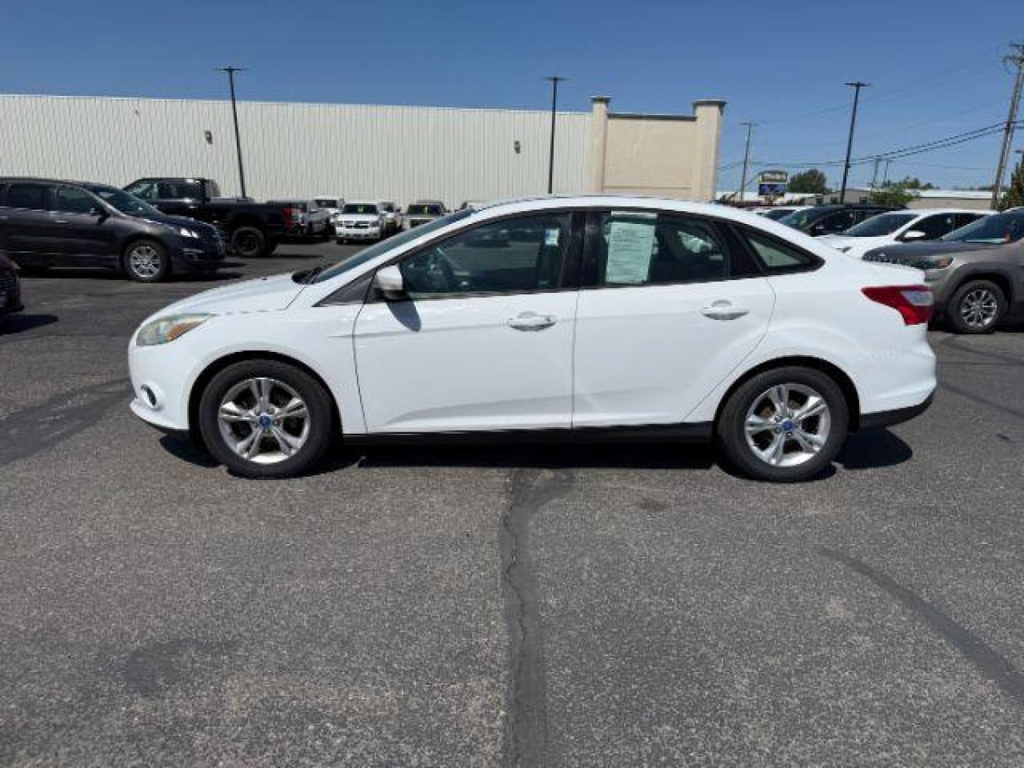 2013 Oxford White /Charcoal Black Ford Focus SE (1FADP3F27DL) with an 2L I-4 gasoline direct injection engine, AUTOMATIC transmission, located at 1235 N Woodruff Ave., Idaho Falls, 83401, (208) 523-1053, 43.507172, -112.000488 - At Timberline Auto, finding a great deal on your next vehicle is always easy! Our experienced sales staff's goal is to help find you the right vehicle at the right price! Our knowledgeable finance department has options for almost any credit score. We offer extended service contract options to prote - Photo#20