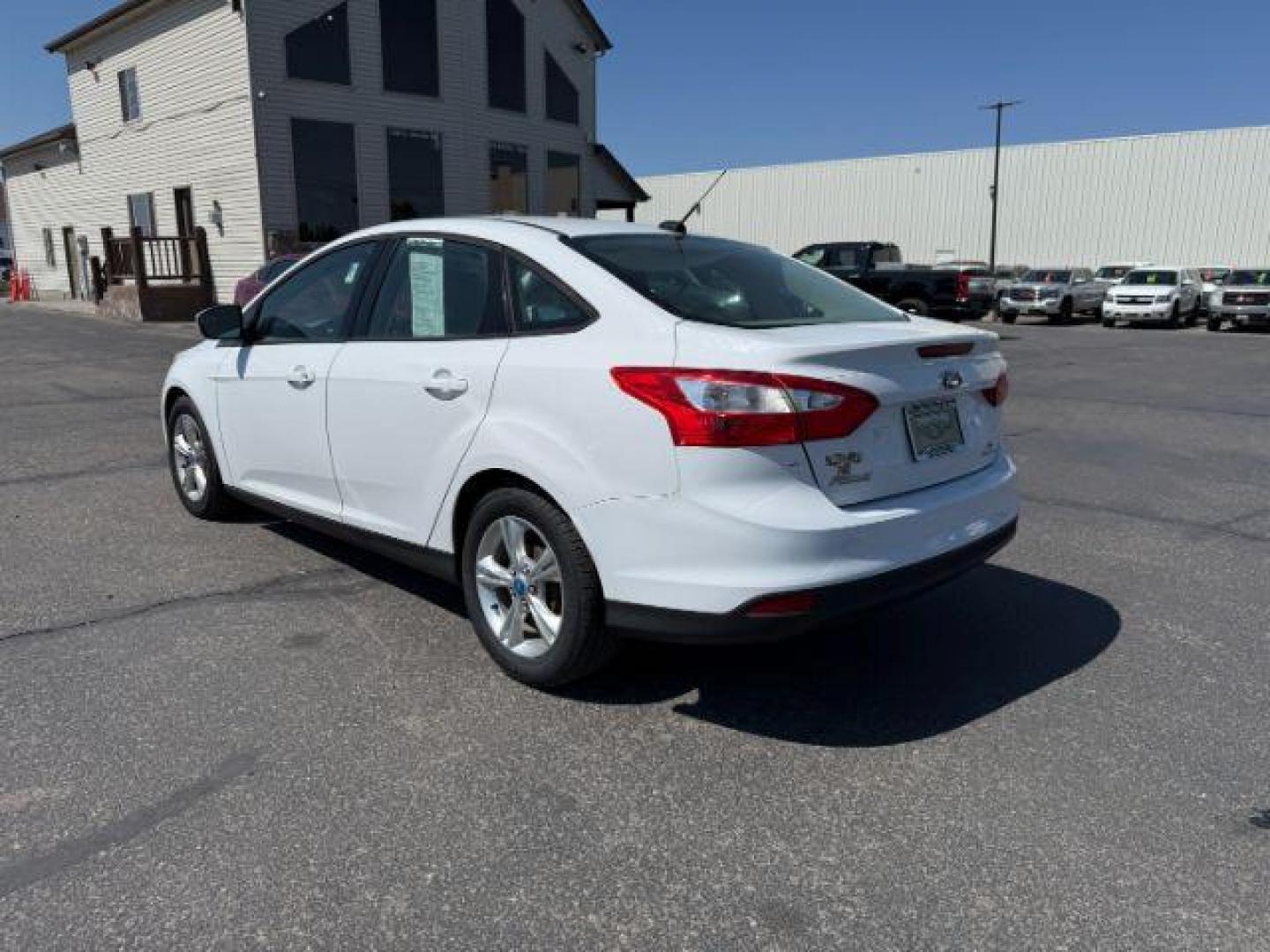 2013 Oxford White /Charcoal Black Ford Focus SE (1FADP3F27DL) with an 2L I-4 gasoline direct injection engine, AUTOMATIC transmission, located at 1235 N Woodruff Ave., Idaho Falls, 83401, (208) 523-1053, 43.507172, -112.000488 - At Timberline Auto, finding a great deal on your next vehicle is always easy! Our experienced sales staff's goal is to help find you the right vehicle at the right price! Our knowledgeable finance department has options for almost any credit score. We offer extended service contract options to prote - Photo#21