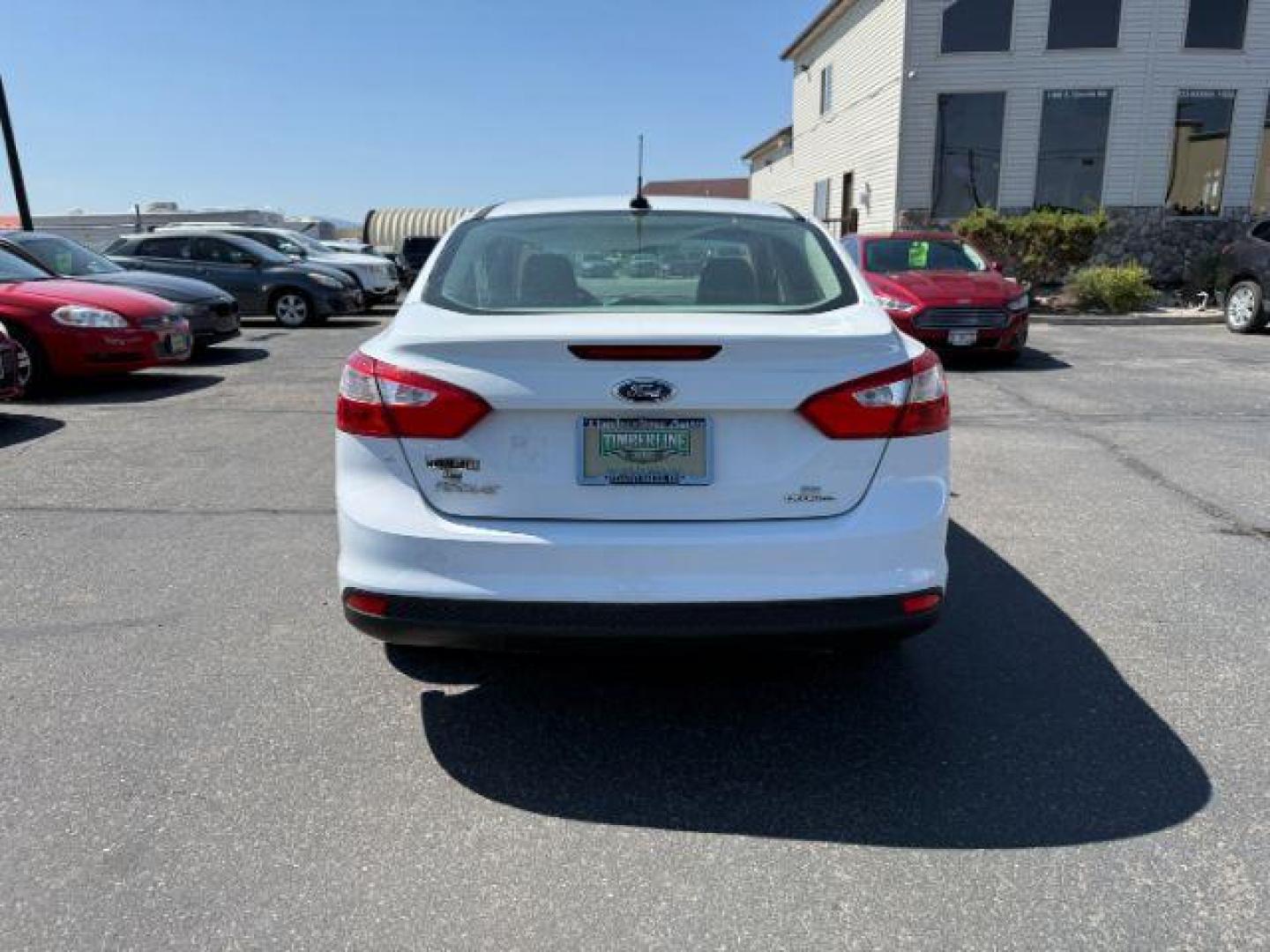 2013 Oxford White /Charcoal Black Ford Focus SE (1FADP3F27DL) with an 2L I-4 gasoline direct injection engine, AUTOMATIC transmission, located at 1235 N Woodruff Ave., Idaho Falls, 83401, (208) 523-1053, 43.507172, -112.000488 - At Timberline Auto, finding a great deal on your next vehicle is always easy! Our experienced sales staff's goal is to help find you the right vehicle at the right price! Our knowledgeable finance department has options for almost any credit score. We offer extended service contract options to prote - Photo#22
