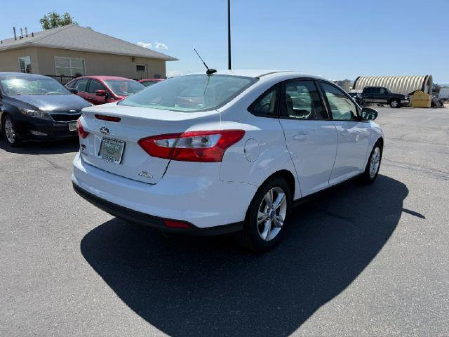 2013 Oxford White /Charcoal Black Ford Focus SE (1FADP3F27DL) with an 2L I-4 gasoline direct injection engine, AUTOMATIC transmission, located at 1235 N Woodruff Ave., Idaho Falls, 83401, (208) 523-1053, 43.507172, -112.000488 - At Timberline Auto, finding a great deal on your next vehicle is always easy! Our experienced sales staff's goal is to help find you the right vehicle at the right price! Our knowledgeable finance department has options for almost any credit score. We offer extended service contract options to prote - Photo#23