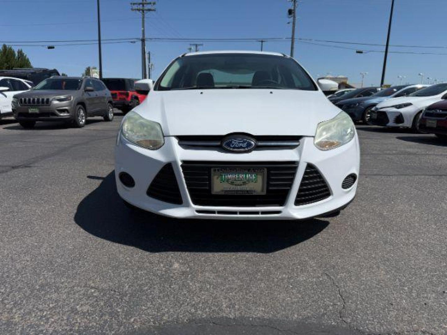 2013 Oxford White /Charcoal Black Ford Focus SE (1FADP3F27DL) with an 2L I-4 gasoline direct injection engine, AUTOMATIC transmission, located at 1235 N Woodruff Ave., Idaho Falls, 83401, (208) 523-1053, 43.507172, -112.000488 - At Timberline Auto, finding a great deal on your next vehicle is always easy! Our experienced sales staff's goal is to help find you the right vehicle at the right price! Our knowledgeable finance department has options for almost any credit score. We offer extended service contract options to prote - Photo#26