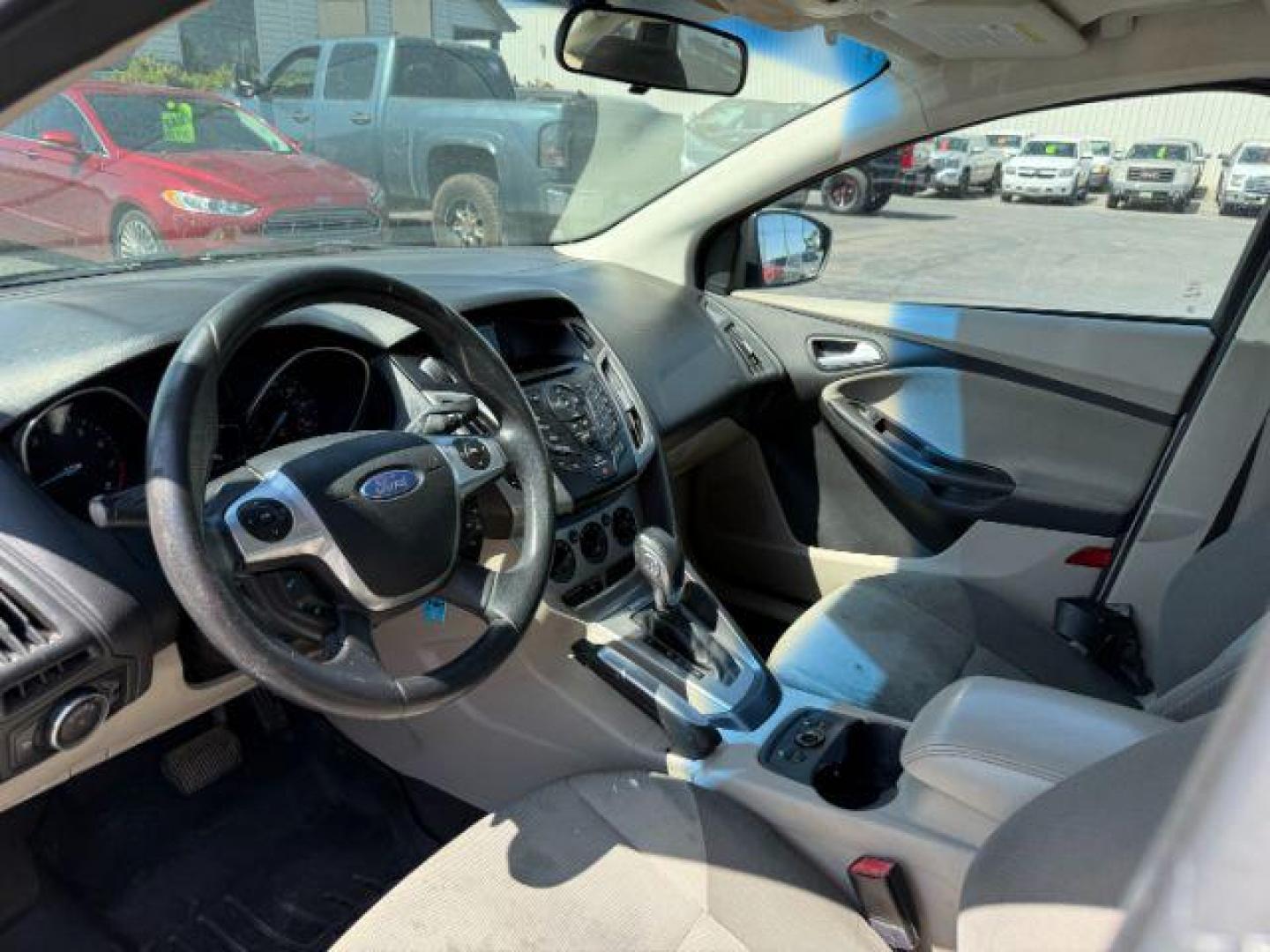 2013 Oxford White /Charcoal Black Ford Focus SE (1FADP3F27DL) with an 2L I-4 gasoline direct injection engine, AUTOMATIC transmission, located at 1235 N Woodruff Ave., Idaho Falls, 83401, (208) 523-1053, 43.507172, -112.000488 - At Timberline Auto, finding a great deal on your next vehicle is always easy! Our experienced sales staff's goal is to help find you the right vehicle at the right price! Our knowledgeable finance department has options for almost any credit score. We offer extended service contract options to prote - Photo#29