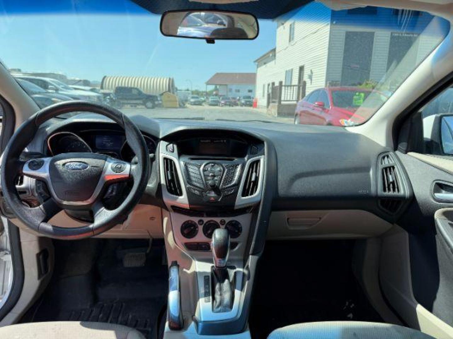 2013 Oxford White /Charcoal Black Ford Focus SE (1FADP3F27DL) with an 2L I-4 gasoline direct injection engine, AUTOMATIC transmission, located at 1235 N Woodruff Ave., Idaho Falls, 83401, (208) 523-1053, 43.507172, -112.000488 - At Timberline Auto, finding a great deal on your next vehicle is always easy! Our experienced sales staff's goal is to help find you the right vehicle at the right price! Our knowledgeable finance department has options for almost any credit score. We offer extended service contract options to prote - Photo#35