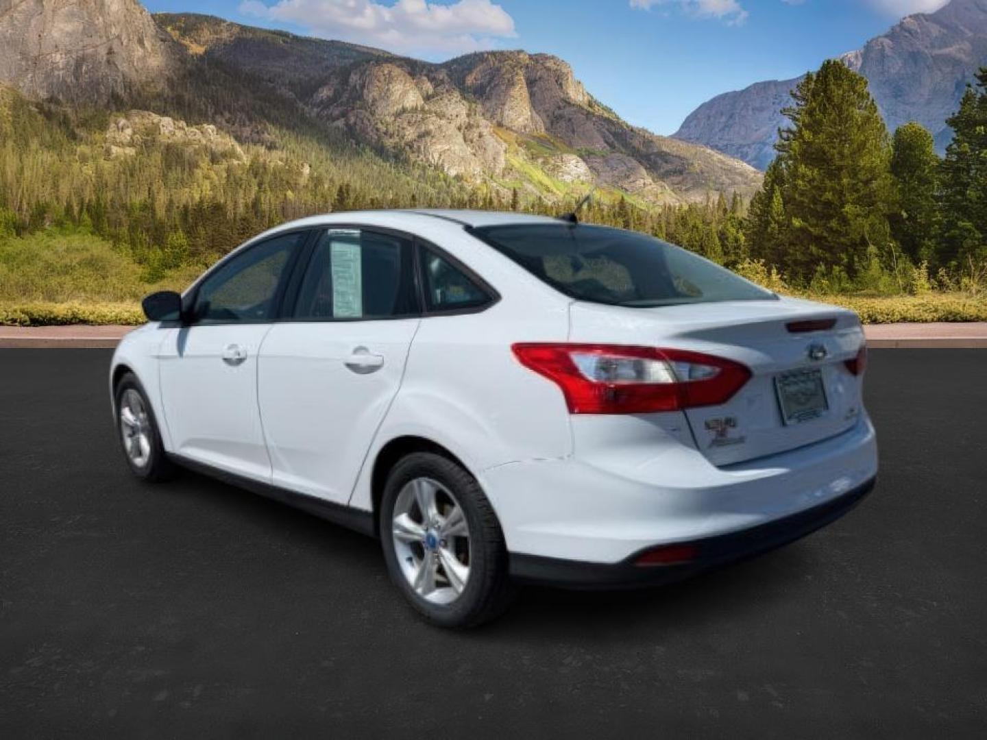 2013 Oxford White /Charcoal Black Ford Focus SE (1FADP3F27DL) with an 2L I-4 gasoline direct injection engine, AUTOMATIC transmission, located at 1235 N Woodruff Ave., Idaho Falls, 83401, (208) 523-1053, 43.507172, -112.000488 - At Timberline Auto, finding a great deal on your next vehicle is always easy! Our experienced sales staff's goal is to help find you the right vehicle at the right price! Our knowledgeable finance department has options for almost any credit score. We offer extended service contract options to prote - Photo#2