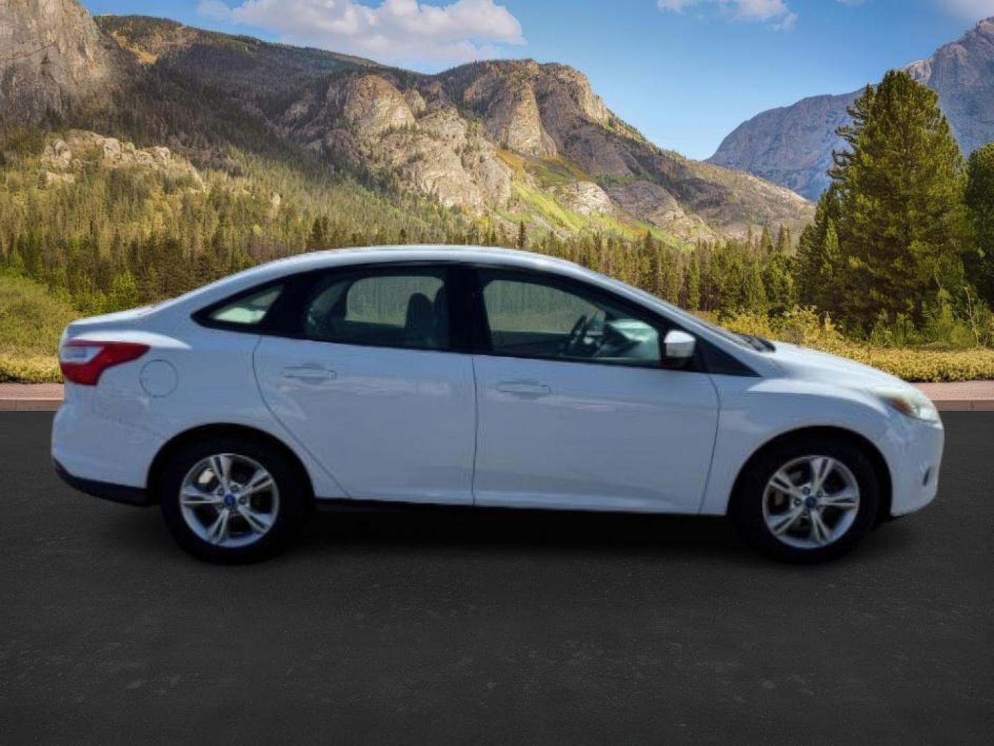 2013 Oxford White /Charcoal Black Ford Focus SE (1FADP3F27DL) with an 2L I-4 gasoline direct injection engine, AUTOMATIC transmission, located at 1235 N Woodruff Ave., Idaho Falls, 83401, (208) 523-1053, 43.507172, -112.000488 - At Timberline Auto, finding a great deal on your next vehicle is always easy! Our experienced sales staff's goal is to help find you the right vehicle at the right price! Our knowledgeable finance department has options for almost any credit score. We offer extended service contract options to prote - Photo#5