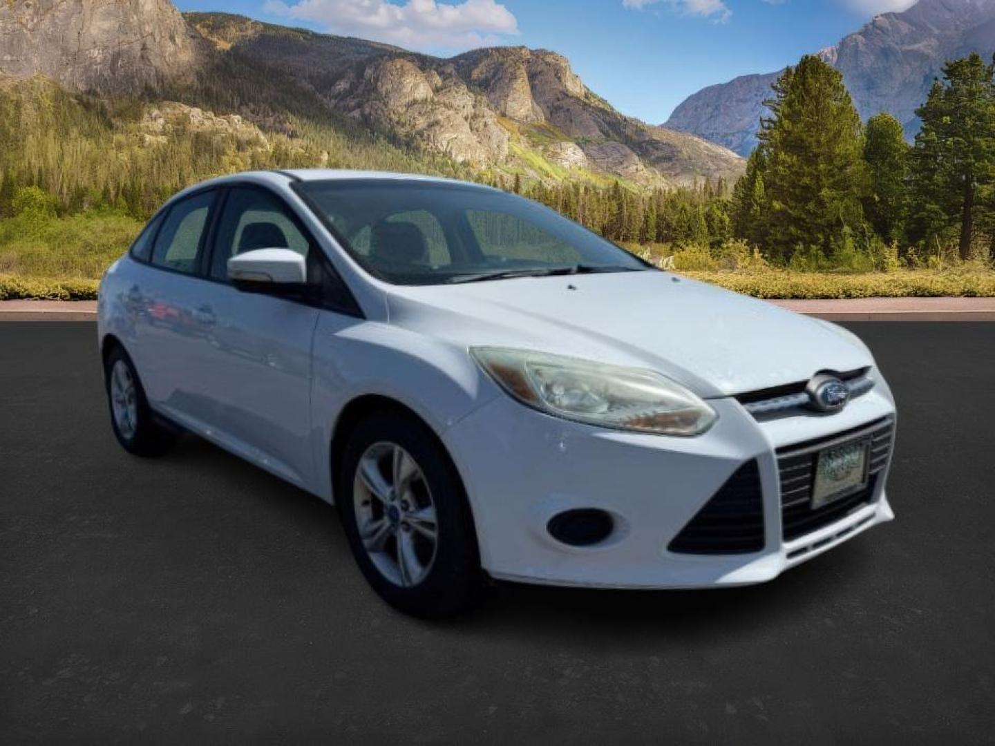 2013 Oxford White /Charcoal Black Ford Focus SE (1FADP3F27DL) with an 2L I-4 gasoline direct injection engine, AUTOMATIC transmission, located at 1235 N Woodruff Ave., Idaho Falls, 83401, (208) 523-1053, 43.507172, -112.000488 - At Timberline Auto, finding a great deal on your next vehicle is always easy! Our experienced sales staff's goal is to help find you the right vehicle at the right price! Our knowledgeable finance department has options for almost any credit score. We offer extended service contract options to prote - Photo#6