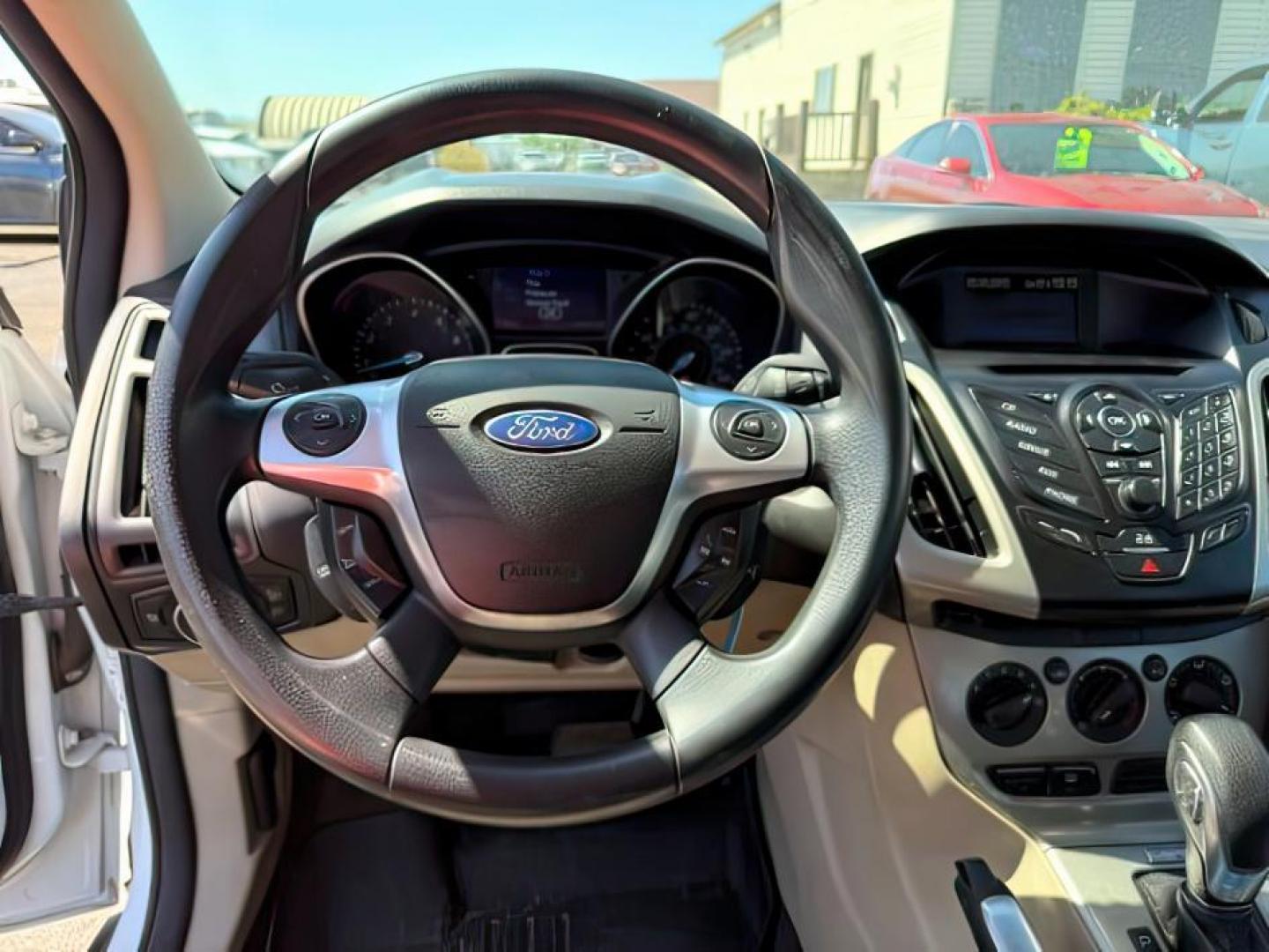 2013 Oxford White /Charcoal Black Ford Focus SE (1FADP3F27DL) with an 2L I-4 gasoline direct injection engine, AUTOMATIC transmission, located at 1235 N Woodruff Ave., Idaho Falls, 83401, (208) 523-1053, 43.507172, -112.000488 - At Timberline Auto, finding a great deal on your next vehicle is always easy! Our experienced sales staff's goal is to help find you the right vehicle at the right price! Our knowledgeable finance department has options for almost any credit score. We offer extended service contract options to prote - Photo#11