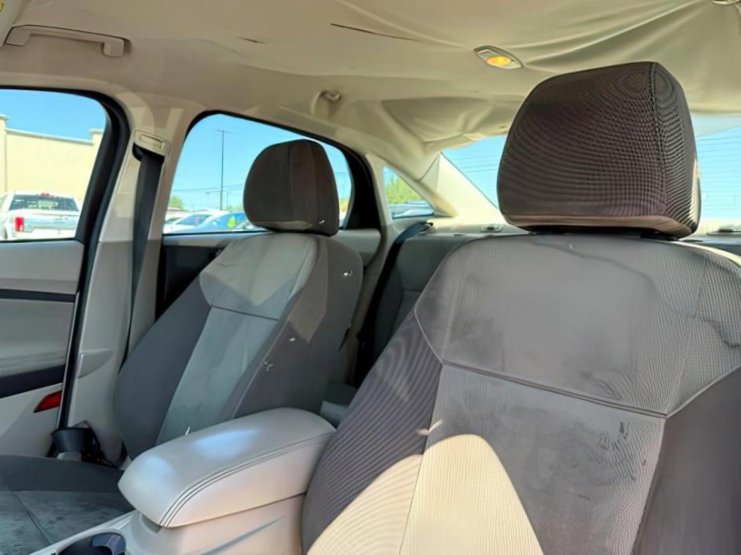 2013 Oxford White /Charcoal Black Ford Focus SE (1FADP3F27DL) with an 2L I-4 gasoline direct injection engine, AUTOMATIC transmission, located at 1235 N Woodruff Ave., Idaho Falls, 83401, (208) 523-1053, 43.507172, -112.000488 - At Timberline Auto, finding a great deal on your next vehicle is always easy! Our experienced sales staff's goal is to help find you the right vehicle at the right price! Our knowledgeable finance department has options for almost any credit score. We offer extended service contract options to prote - Photo#14
