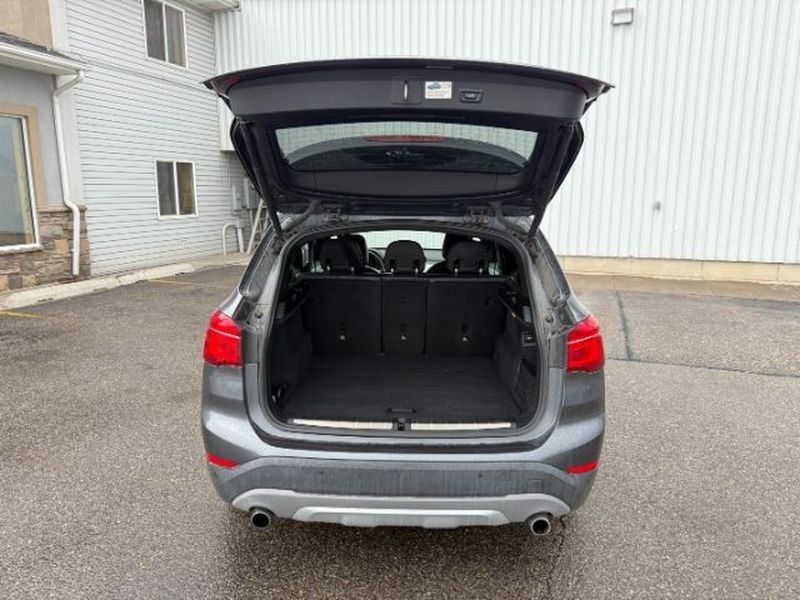 2016 Mineral Gray Metallic /Black BMW X1 xDrive28i (WBXHT3C3XG5) with an 4 Cyl, 2.0L engine, 8-speed automatic transmission, located at 1175 N Woodruff Ave, Idaho Falls, ID, 83401, 43.506901, -111.999657 - <b>Vehicle Details</b><br>Experience confident driving in this pre-owned 2016 BMW X1 xDrive28i, now available in Idaho Falls, ID. Powered by a responsive 4-cylinder, 2.0L gasoline engine and equipped with BMW xDrive AWD, this luxury compact SUV delivers balanced performance, surefooted handling, and- Photo#5