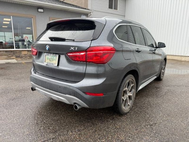 2016 Mineral Gray Metallic /Black BMW X1 xDrive28i (WBXHT3C3XG5) with an 4 Cyl, 2.0L engine, 8-speed automatic transmission, located at 1175 N Woodruff Ave, Idaho Falls, ID, 83401, 43.506901, -111.999657 - <b>Vehicle Details</b><br>Experience confident driving in this pre-owned 2016 BMW X1 xDrive28i, now available in Idaho Falls, ID. Powered by a responsive 4-cylinder, 2.0L gasoline engine and equipped with BMW xDrive AWD, this luxury compact SUV delivers balanced performance, surefooted handling, and- Photo#8