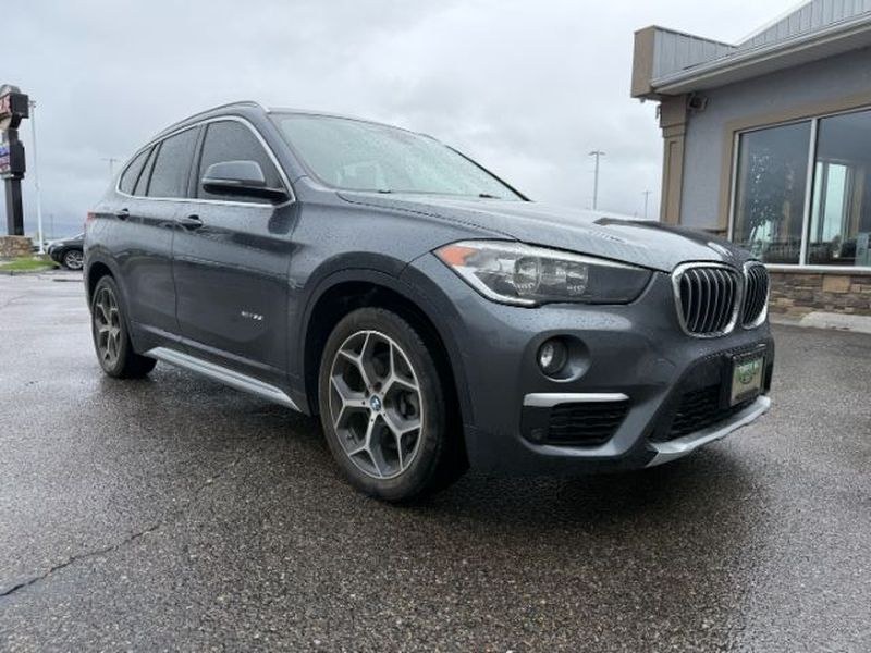 2016 Mineral Gray Metallic /Black BMW X1 xDrive28i (WBXHT3C3XG5) with an 4 Cyl, 2.0L engine, 8-speed automatic transmission, located at 1175 N Woodruff Ave, Idaho Falls, ID, 83401, 43.506901, -111.999657 - <b>Vehicle Details</b><br>Experience confident driving in this pre-owned 2016 BMW X1 xDrive28i, now available in Idaho Falls, ID. Powered by a responsive 4-cylinder, 2.0L gasoline engine and equipped with BMW xDrive AWD, this luxury compact SUV delivers balanced performance, surefooted handling, and- Photo#10