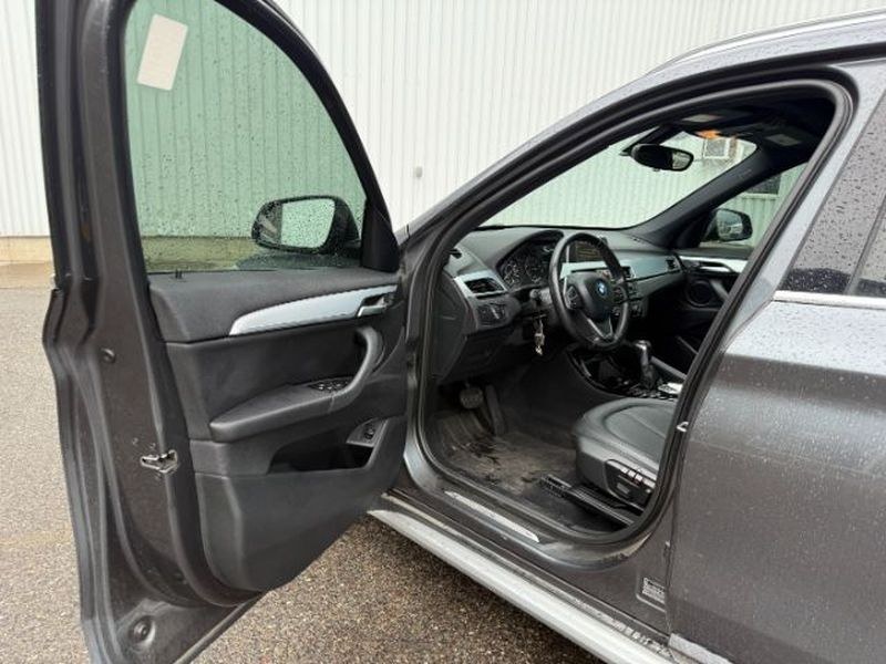 2016 Mineral Gray Metallic /Black BMW X1 xDrive28i (WBXHT3C3XG5) with an 4 Cyl, 2.0L engine, 8-speed automatic transmission, located at 1175 N Woodruff Ave, Idaho Falls, ID, 83401, 43.506901, -111.999657 - <b>Vehicle Details</b><br>Experience confident driving in this pre-owned 2016 BMW X1 xDrive28i, now available in Idaho Falls, ID. Powered by a responsive 4-cylinder, 2.0L gasoline engine and equipped with BMW xDrive AWD, this luxury compact SUV delivers balanced performance, surefooted handling, and- Photo#13