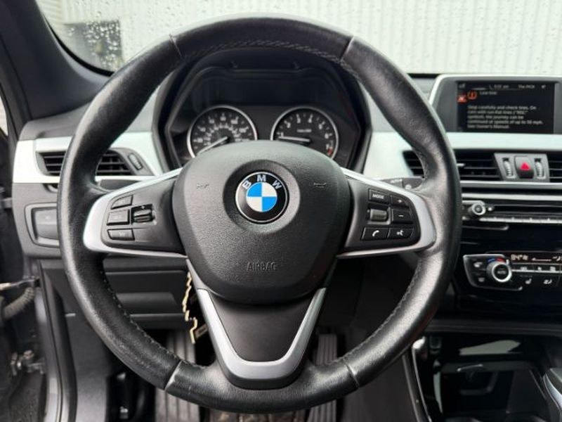 2016 Mineral Gray Metallic /Black BMW X1 xDrive28i (WBXHT3C3XG5) with an 4 Cyl, 2.0L engine, 8-speed automatic transmission, located at 1175 N Woodruff Ave, Idaho Falls, ID, 83401, 43.506901, -111.999657 - <b>Vehicle Details</b><br>Experience confident driving in this pre-owned 2016 BMW X1 xDrive28i, now available in Idaho Falls, ID. Powered by a responsive 4-cylinder, 2.0L gasoline engine and equipped with BMW xDrive AWD, this luxury compact SUV delivers balanced performance, surefooted handling, and- Photo#16