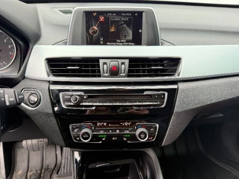 2016 Mineral Gray Metallic /Black BMW X1 xDrive28i (WBXHT3C3XG5) with an 4 Cyl, 2.0L engine, 8-speed automatic transmission, located at 1175 N Woodruff Ave, Idaho Falls, ID, 83401, 43.506901, -111.999657 - <b>Vehicle Details</b><br>Experience confident driving in this pre-owned 2016 BMW X1 xDrive28i, now available in Idaho Falls, ID. Powered by a responsive 4-cylinder, 2.0L gasoline engine and equipped with BMW xDrive AWD, this luxury compact SUV delivers balanced performance, surefooted handling, and- Photo#17
