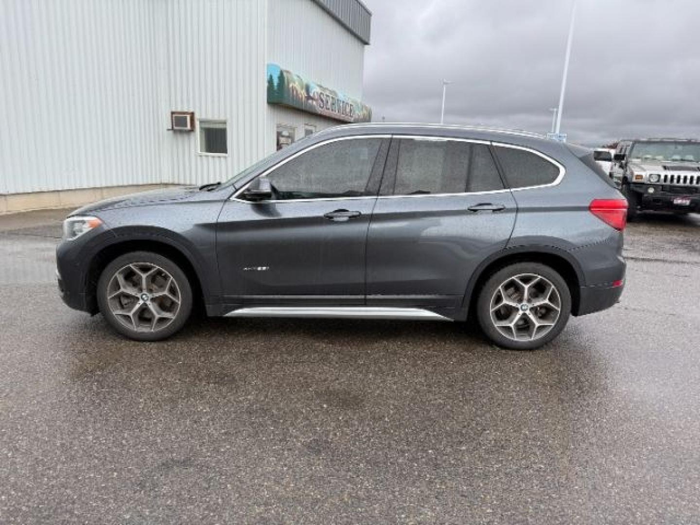 2016 BLACK /Black BMW X1 xDrive28i (WBXHT3C3XG5) with an 2L I-4 gasoline direct injection engine, AUTOMATIC transmission, located at 1235 N Woodruff Ave., Idaho Falls, 83401, (208) 523-1053, 43.507172, -112.000488 - At Timberline Auto, finding a great deal on your next vehicle is always easy! Our experienced sales staff's goal is to help find you the right vehicle at the right price! Our knowledgeable finance department has options for almost any credit score. We offer extended service contract options to prote - Photo#29
