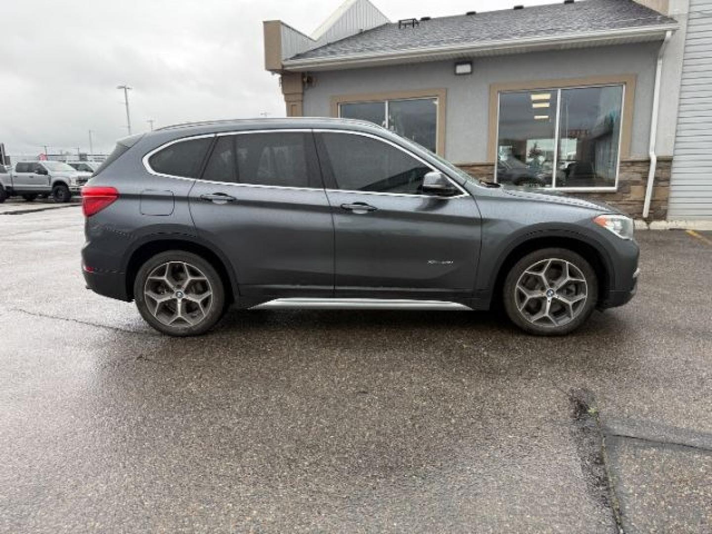 2016 BLACK /Black BMW X1 xDrive28i (WBXHT3C3XG5) with an 2L I-4 gasoline direct injection engine, AUTOMATIC transmission, located at 1235 N Woodruff Ave., Idaho Falls, 83401, (208) 523-1053, 43.507172, -112.000488 - At Timberline Auto, finding a great deal on your next vehicle is always easy! Our experienced sales staff's goal is to help find you the right vehicle at the right price! Our knowledgeable finance department has options for almost any credit score. We offer extended service contract options to prote - Photo#37