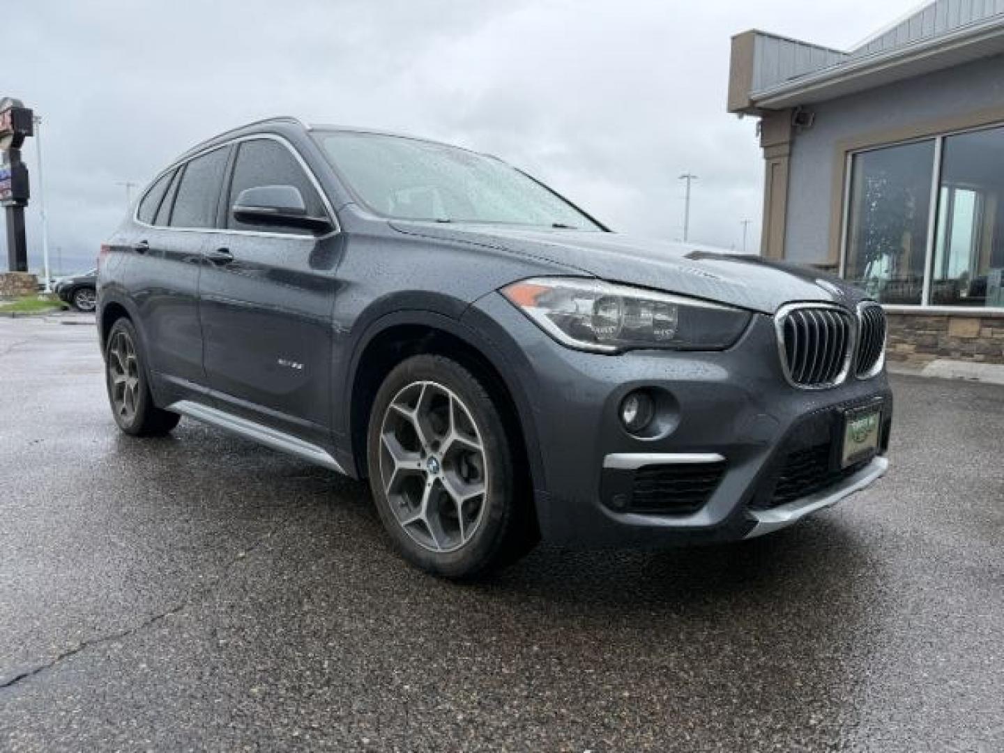 2016 BLACK /Black BMW X1 xDrive28i (WBXHT3C3XG5) with an 2L I-4 gasoline direct injection engine, AUTOMATIC transmission, located at 1235 N Woodruff Ave., Idaho Falls, 83401, (208) 523-1053, 43.507172, -112.000488 - At Timberline Auto, finding a great deal on your next vehicle is always easy! Our experienced sales staff's goal is to help find you the right vehicle at the right price! Our knowledgeable finance department has options for almost any credit score. We offer extended service contract options to prote - Photo#38