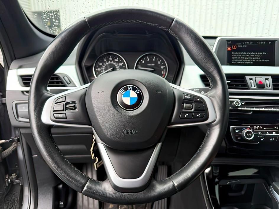 2016 BLACK /Black BMW X1 (WBXHT3C3XG5) with an 2L I-4 gasoline direct injection engine, Automatic transmission, located at 1175 N Woodruff Ave, Idaho Falls, ID, 83401, 43.506901, -111.999657 - At Timberline Auto, finding a great deal on your next vehicle is always easy! Our experienced sales staff's goal is to help find you the right vehicle at the right price! Our knowledgeable finance department has options for almost any credit score. We offer extended service contract options to prote - Photo#16