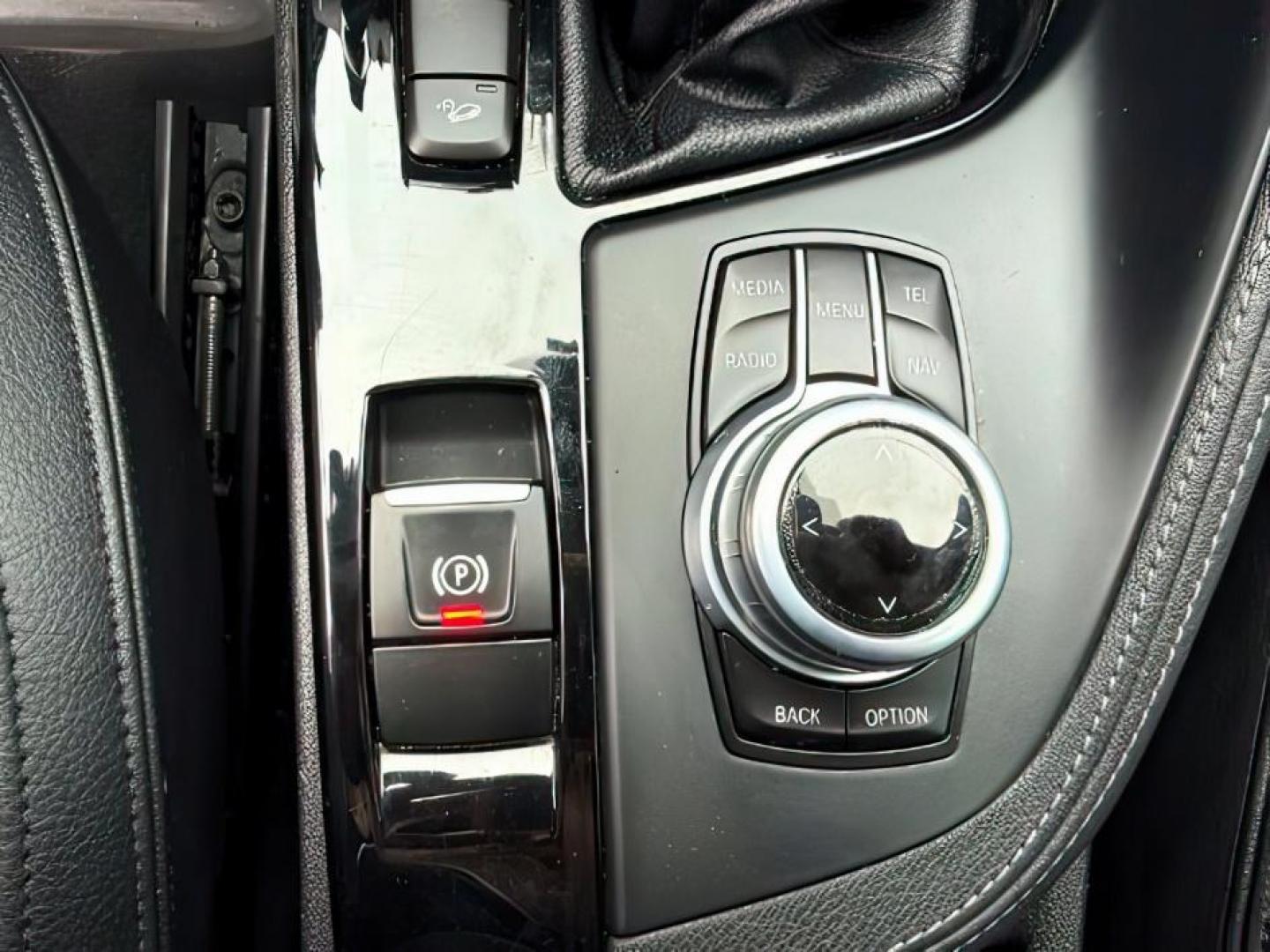 2016 BLACK /Black BMW X1 xDrive28i (WBXHT3C3XG5) with an 2L I-4 gasoline direct injection engine, AUTOMATIC transmission, located at 1235 N Woodruff Ave., Idaho Falls, 83401, (208) 523-1053, 43.507172, -112.000488 - At Timberline Auto, finding a great deal on your next vehicle is always easy! Our experienced sales staff's goal is to help find you the right vehicle at the right price! Our knowledgeable finance department has options for almost any credit score. We offer extended service contract options to prote - Photo#19