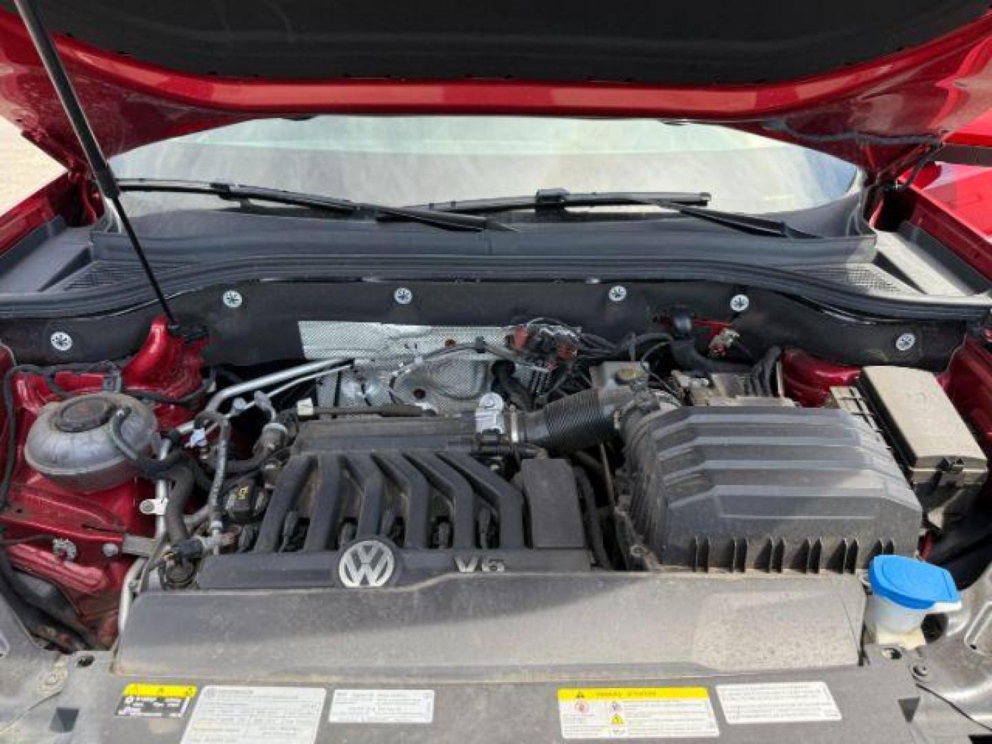2021 Aurora Red Metallic /Titan Black Volkswagen Atlas (1V2BR2CA0MC) with an 36L V-6 gasoline direct injection engine, Automatic transmission, located at 1175 N Woodruff Ave, Idaho Falls, ID, 83401, 43.506901, -111.999657 - Photo#51