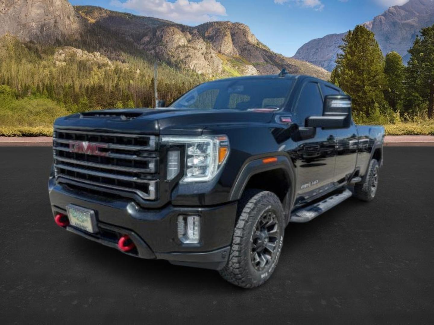 2021 Onyx Black /Jet Black w/Kalahari Accents GMC Sierra 2500HD 4WD Crew Cab Long Bed AT4 (1GT49PEY0MF) with an Duramax 6.6L V-8 diesel direct injection engine, AUTOMATIC transmission, located at 1235 N Woodruff Ave., Idaho Falls, 83401, (208) 523-1053, 43.507172, -112.000488 - At Timberline Auto, finding a great deal on your next vehicle is always easy! Our experienced sales staff's goal is to help find you the right vehicle at the right price! Our knowledgeable finance department has options for almost any credit score. We offer extended service contract options to prote - Photo#0