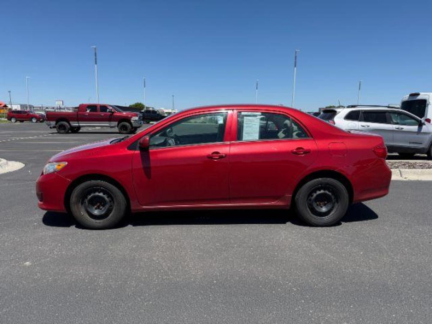 2010 Barcelona Red Metallic /Ash Toyota Corolla LE (1NXBU4EE7AZ) with an 1.8L I-4 DOHC engine, AUTOMATIC transmission, located at 1235 N Woodruff Ave., Idaho Falls, 83401, (208) 523-1053, 43.507172, -112.000488 - Photo#0