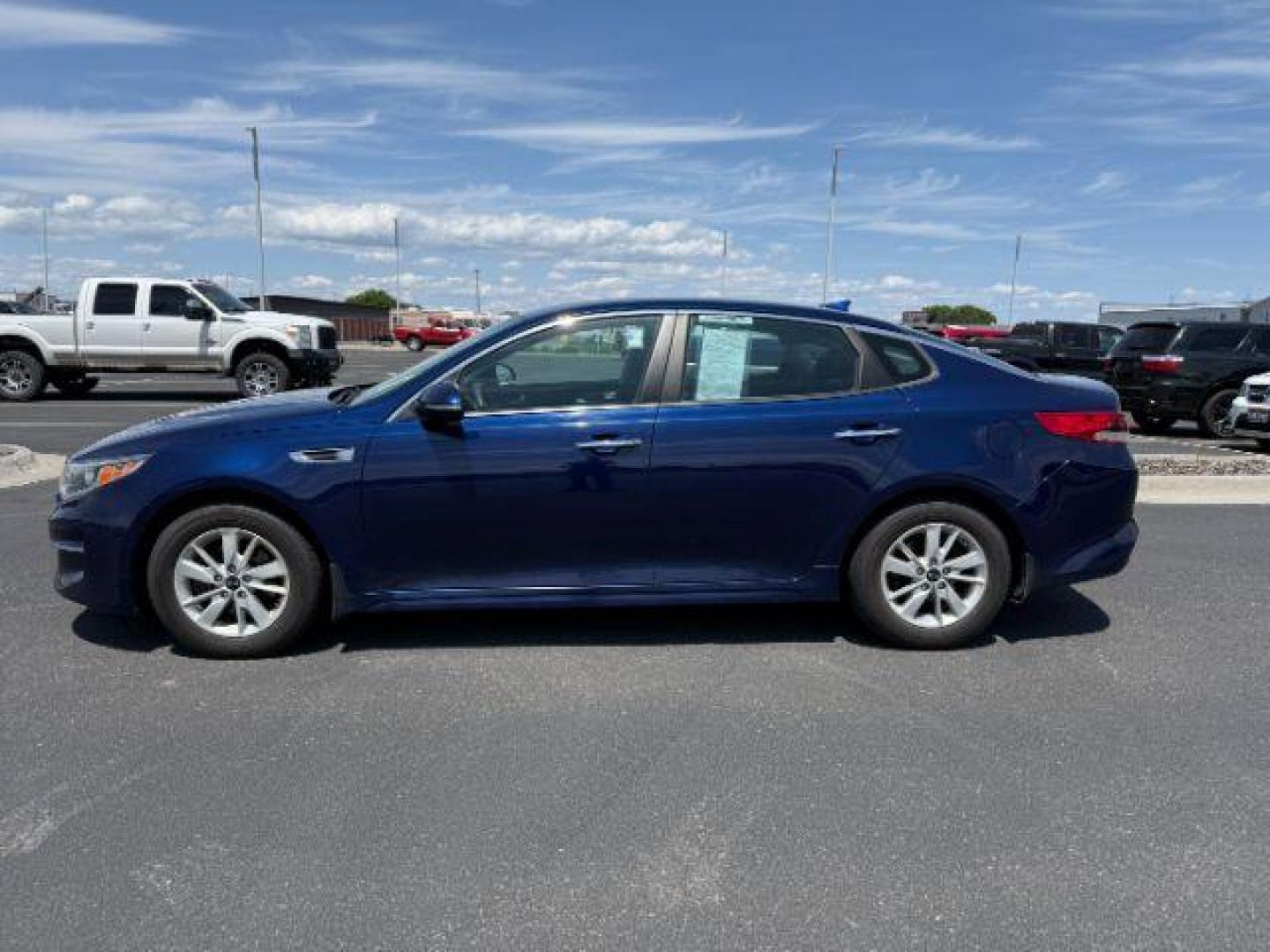 2017 Horizon Blue /Black Kia Optima LX (5XXGT4L31HG) with an Theta II 2.4L I-4 gasoline direct injection engine, AUTOMATIC transmission, located at 1235 N Woodruff Ave., Idaho Falls, 83401, (208) 523-1053, 43.507172, -112.000488 - At Timberline Auto, finding a great deal on your next vehicle is always easy! Our experienced sales staff's goal is to help find you the right vehicle at the right price! Our knowledgeable finance department has options for almost any credit score. We offer extended service contract options to prote - Photo#0