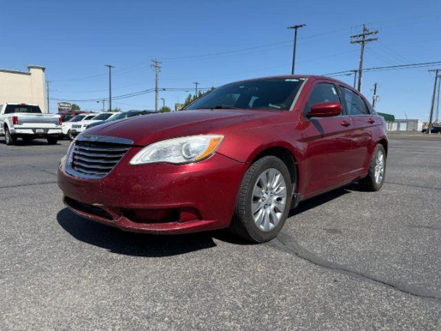2013 RED /CLOTH Chrysler 200 SE (1C3CCBAB7DN) with an 2.4 engine, AUTOMATIC transmission, located at 1235 N Woodruff Ave., Idaho Falls, 83401, (208) 523-1053, 43.507172, -112.000488 - At Timberline Auto, finding a great deal on your next vehicle is always easy! Our experienced sales staff's goal is to help find you the right vehicle at the right price! Our knowledgeable finance department has options for almost any credit score. We offer extended service contract options to prote - Photo#17