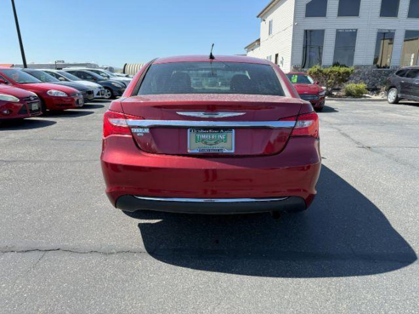 2013 RED /CLOTH Chrysler 200 SE (1C3CCBAB7DN) with an 2.4 engine, AUTOMATIC transmission, located at 1235 N Woodruff Ave., Idaho Falls, 83401, (208) 523-1053, 43.507172, -112.000488 - At Timberline Auto, finding a great deal on your next vehicle is always easy! Our experienced sales staff's goal is to help find you the right vehicle at the right price! Our knowledgeable finance department has options for almost any credit score. We offer extended service contract options to prote - Photo#20