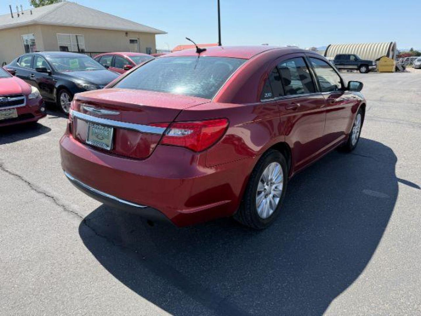 2013 RED /CLOTH Chrysler 200 SE (1C3CCBAB7DN) with an 2.4 engine, AUTOMATIC transmission, located at 1235 N Woodruff Ave., Idaho Falls, 83401, (208) 523-1053, 43.507172, -112.000488 - At Timberline Auto, finding a great deal on your next vehicle is always easy! Our experienced sales staff's goal is to help find you the right vehicle at the right price! Our knowledgeable finance department has options for almost any credit score. We offer extended service contract options to prote - Photo#21