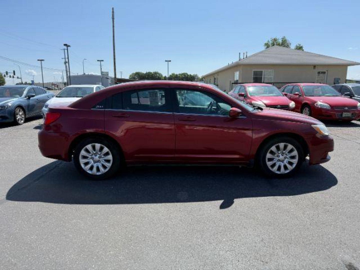2013 RED /CLOTH Chrysler 200 SE (1C3CCBAB7DN) with an 2.4 engine, AUTOMATIC transmission, located at 1235 N Woodruff Ave., Idaho Falls, 83401, (208) 523-1053, 43.507172, -112.000488 - At Timberline Auto, finding a great deal on your next vehicle is always easy! Our experienced sales staff's goal is to help find you the right vehicle at the right price! Our knowledgeable finance department has options for almost any credit score. We offer extended service contract options to prote - Photo#22
