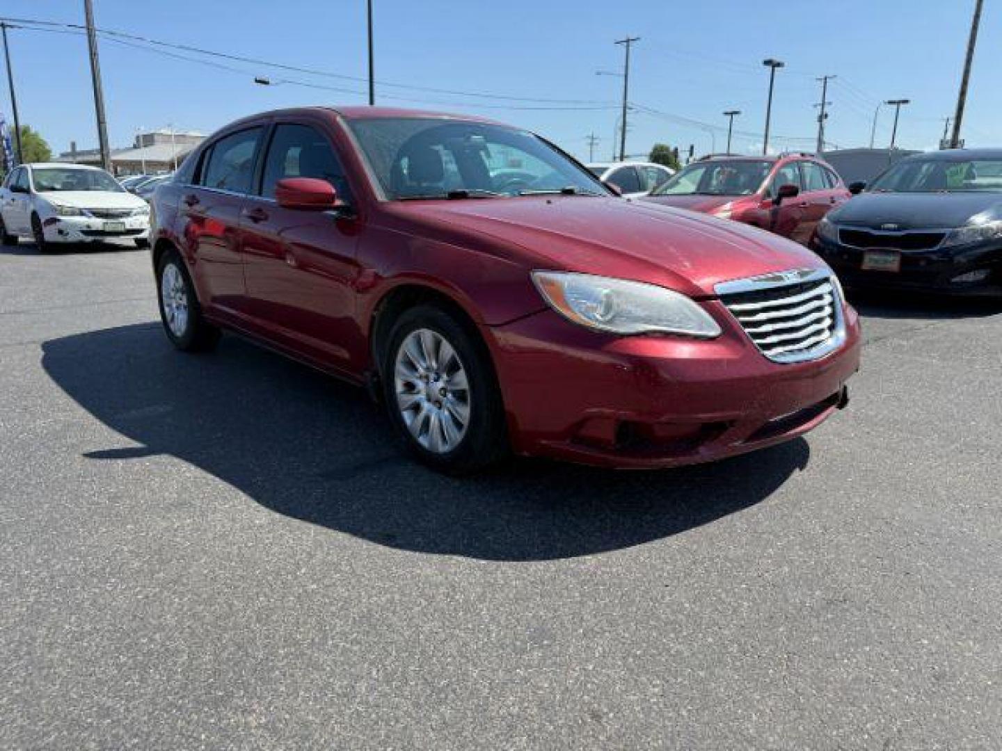 2013 RED /CLOTH Chrysler 200 SE (1C3CCBAB7DN) with an 2.4 engine, AUTOMATIC transmission, located at 1235 N Woodruff Ave., Idaho Falls, 83401, (208) 523-1053, 43.507172, -112.000488 - At Timberline Auto, finding a great deal on your next vehicle is always easy! Our experienced sales staff's goal is to help find you the right vehicle at the right price! Our knowledgeable finance department has options for almost any credit score. We offer extended service contract options to prote - Photo#23