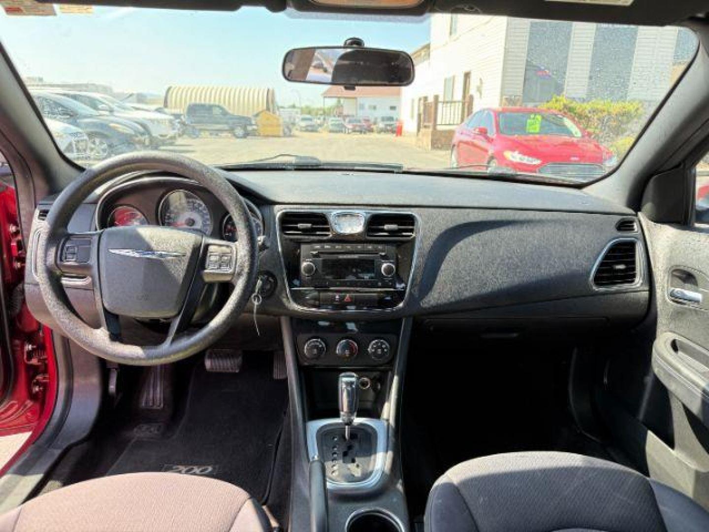 2013 RED /CLOTH Chrysler 200 SE (1C3CCBAB7DN) with an 2.4 engine, AUTOMATIC transmission, located at 1235 N Woodruff Ave., Idaho Falls, 83401, (208) 523-1053, 43.507172, -112.000488 - At Timberline Auto, finding a great deal on your next vehicle is always easy! Our experienced sales staff's goal is to help find you the right vehicle at the right price! Our knowledgeable finance department has options for almost any credit score. We offer extended service contract options to prote - Photo#31