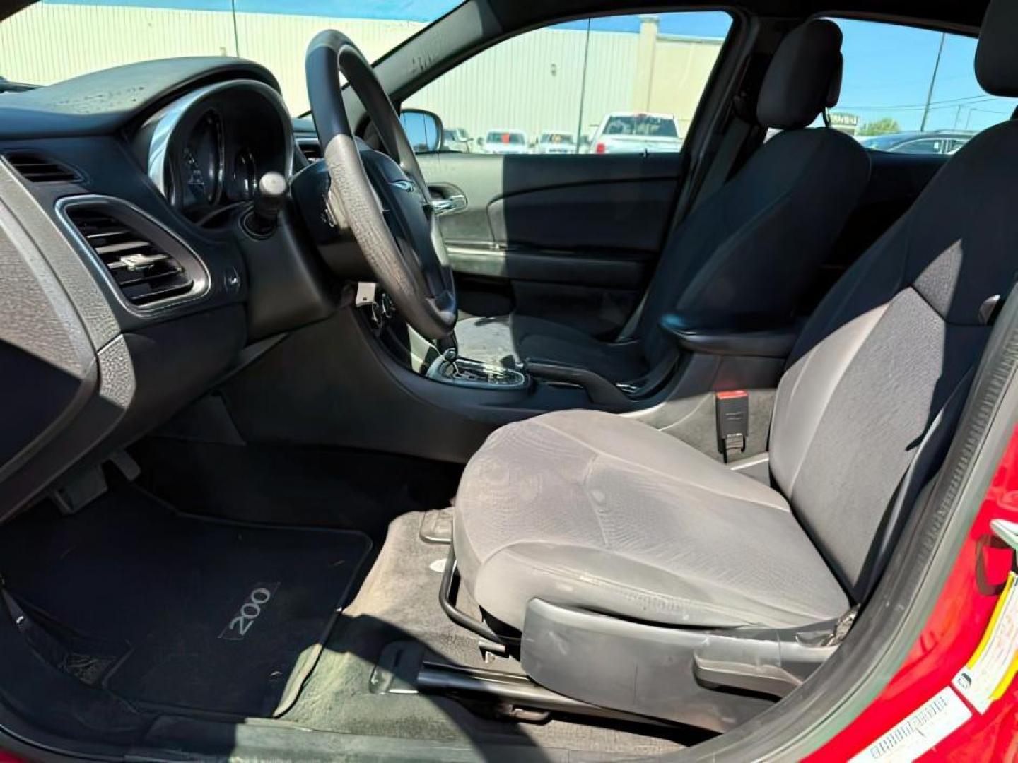 2013 RED /CLOTH Chrysler 200 SE (1C3CCBAB7DN) with an 2.4 engine, AUTOMATIC transmission, located at 1235 N Woodruff Ave., Idaho Falls, 83401, (208) 523-1053, 43.507172, -112.000488 - At Timberline Auto, finding a great deal on your next vehicle is always easy! Our experienced sales staff's goal is to help find you the right vehicle at the right price! Our knowledgeable finance department has options for almost any credit score. We offer extended service contract options to prote - Photo#8