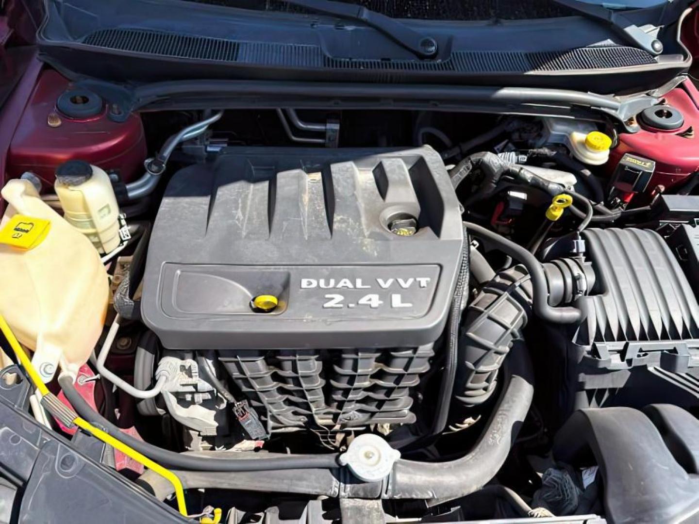 2013 RED /CLOTH Chrysler 200 SE (1C3CCBAB7DN) with an 2.4 engine, AUTOMATIC transmission, located at 1235 N Woodruff Ave., Idaho Falls, 83401, (208) 523-1053, 43.507172, -112.000488 - At Timberline Auto, finding a great deal on your next vehicle is always easy! Our experienced sales staff's goal is to help find you the right vehicle at the right price! Our knowledgeable finance department has options for almost any credit score. We offer extended service contract options to prote - Photo#16