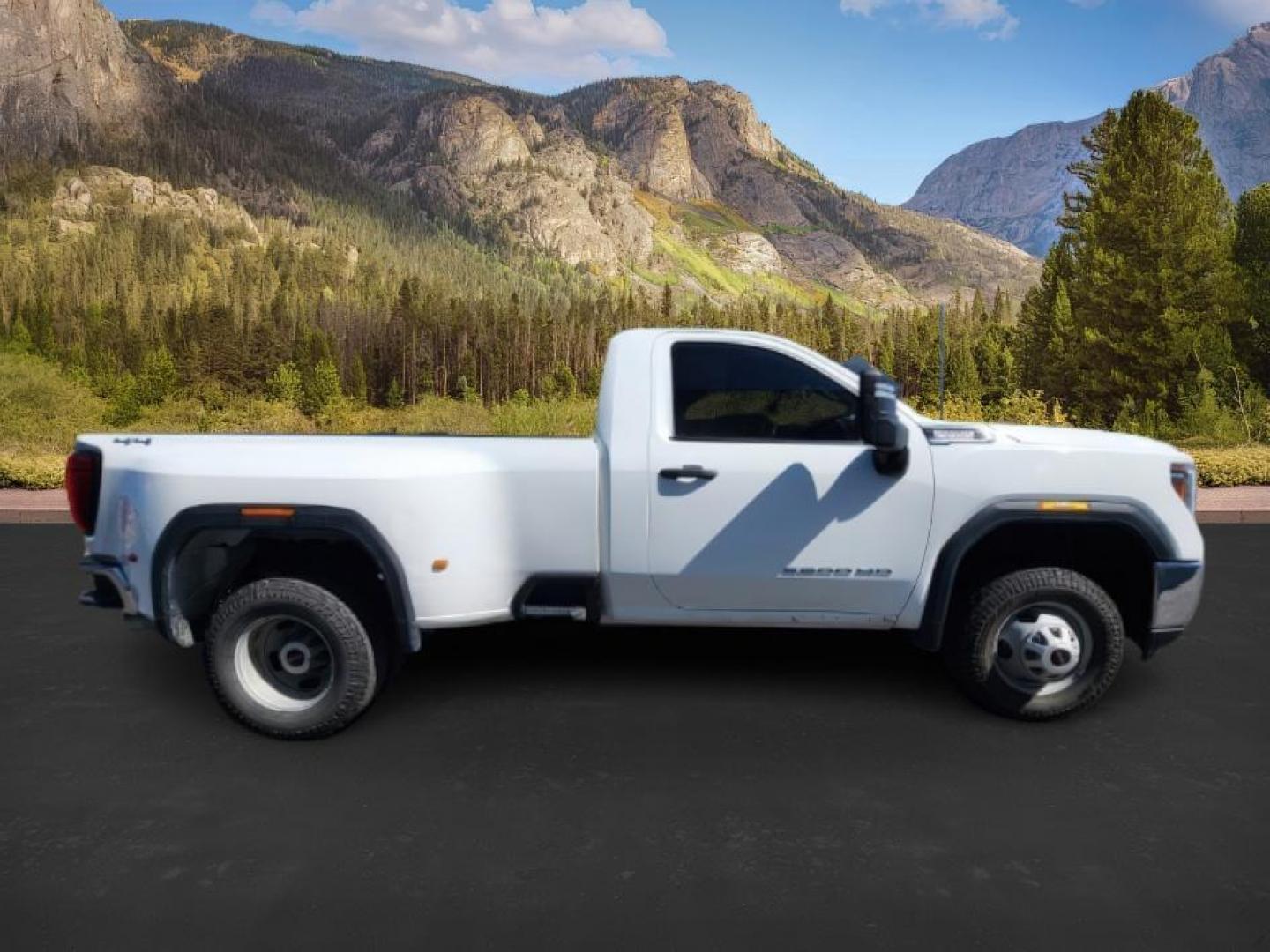 2023 Summit White /Jet Black GMC Sierra 3500HD (1GT39SEY2PF) with an Duramax 66L V-8 diesel direct injection engine, Automatic transmission, located at 1175 N Woodruff Ave, Idaho Falls, ID, 83401, 43.506901, -111.999657 - At Timberline Auto, finding a great deal on your next vehicle is always easy! Our experienced sales staff's goal is to help find you the right vehicle at the right price! Our knowledgeable finance department has options for almost any credit score. We offer extended service contract options to prote - Photo#4