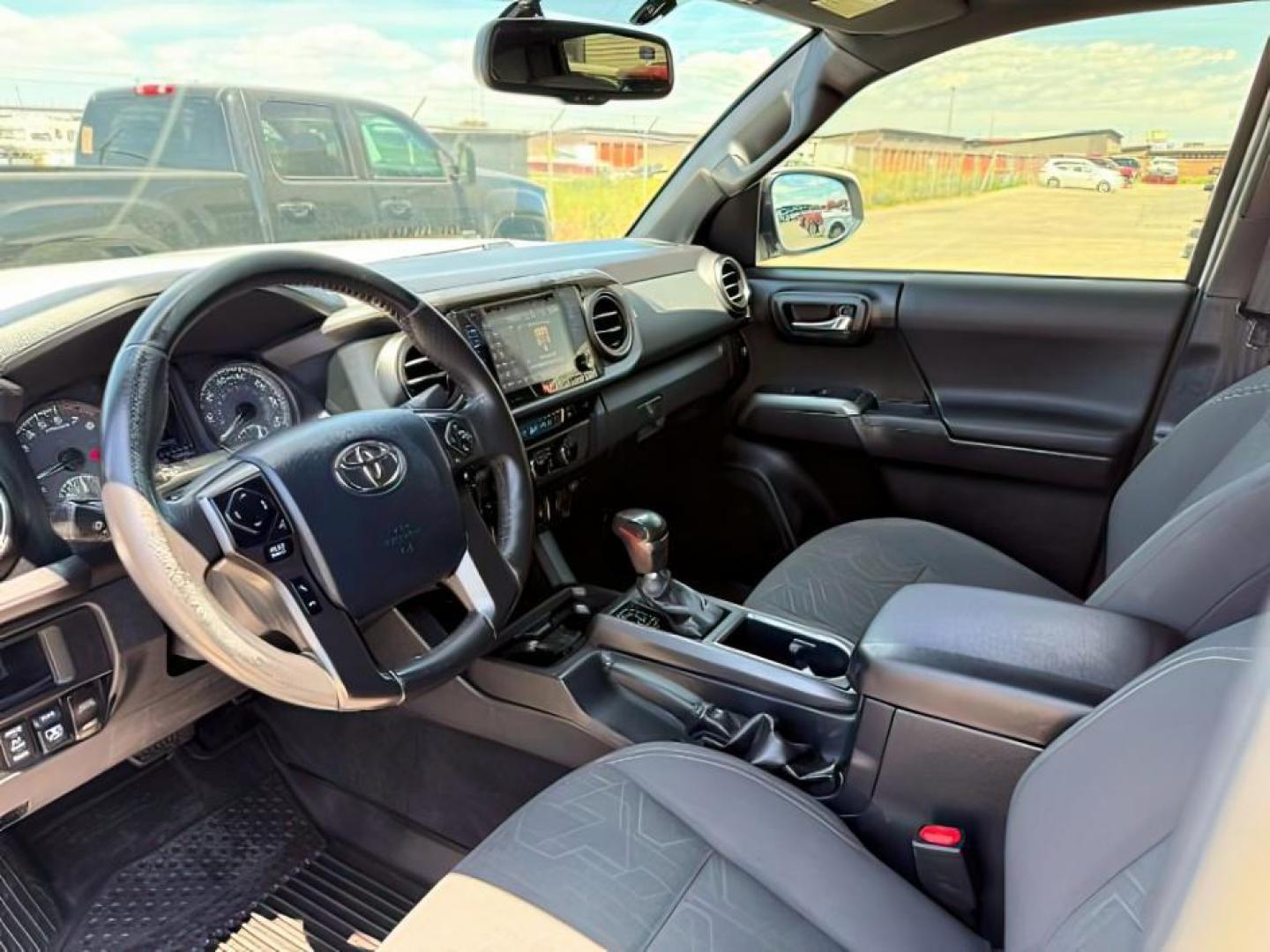 2017 WHITE /CLOTH Toyota Tacoma (3TMCZ5AN1HM) with an 35L V-6 portdirect injection engine, Automatic transmission, located at 1175 N Woodruff Ave, Idaho Falls, ID, 83401, 43.506901, -111.999657 - At Timberline Auto, finding a great deal on your next vehicle is always easy! Our experienced sales staff's goal is to help find you the right vehicle at the right price! Our knowledgeable finance department has options for almost any credit score. We offer extended service contract options to prote - Photo#12