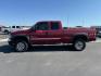 2005 RED /Dark Pewter GMC Sierra 2500HD Work Truck | SLE | SLT (1GTHK29295E) with an 6.6 engine, AUTOMATIC transmission, located at 1235 N Woodruff Ave., Idaho Falls, 83401, (208) 523-1053, 43.507172, -112.000488 - At Timberline Auto, finding a great deal on your next vehicle is always easy! Our experienced sales staff's goal is to help find you the right vehicle at the right price! Our knowledgeable finance department has options for almost any credit score. We offer extended service contract options to prote - Photo#0