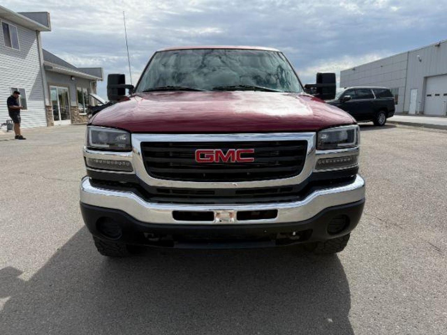 2005 RED /Dark Pewter GMC Sierra 2500HD (1GTHK29295E) with an 66 engine, Automatic transmission, located at 1175 N Woodruff Ave, Idaho Falls, ID, 83401, 43.506901, -111.999657 - At Timberline Auto, finding a great deal on your next vehicle is always easy! Our experienced sales staff's goal is to help find you the right vehicle at the right price! Our knowledgeable finance department has options for almost any credit score. We offer extended service contract options to prote - Photo#26