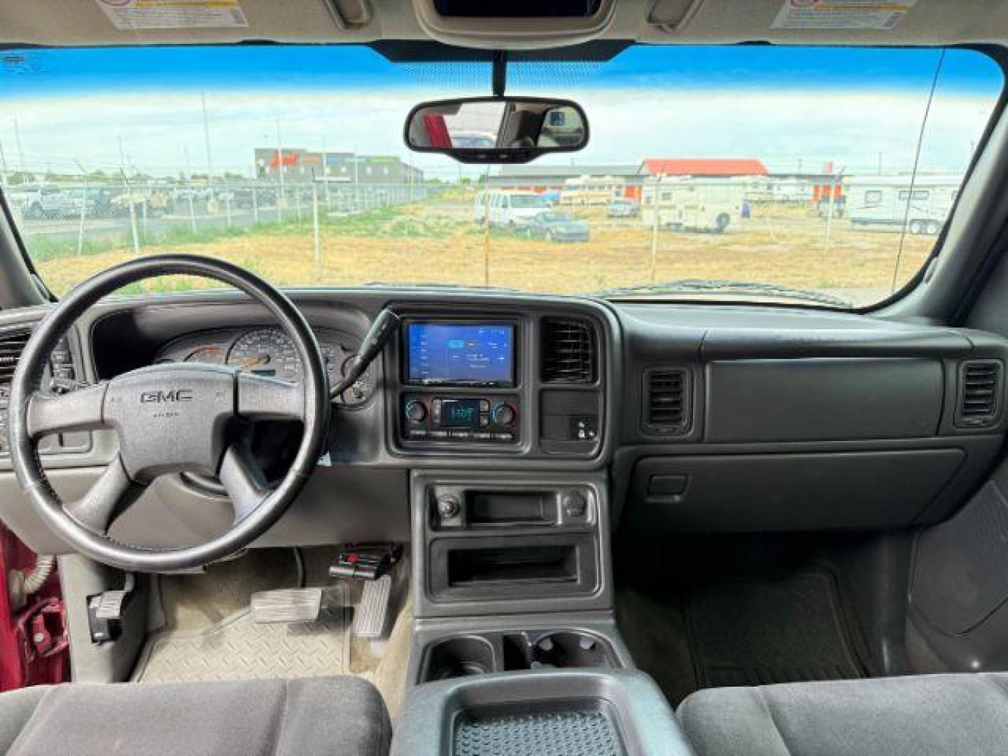 2005 RED /Dark Pewter GMC Sierra 2500HD (1GTHK29295E) with an 66 engine, Automatic transmission, located at 1175 N Woodruff Ave, Idaho Falls, ID, 83401, 43.506901, -111.999657 - At Timberline Auto, finding a great deal on your next vehicle is always easy! Our experienced sales staff's goal is to help find you the right vehicle at the right price! Our knowledgeable finance department has options for almost any credit score. We offer extended service contract options to prote - Photo#35