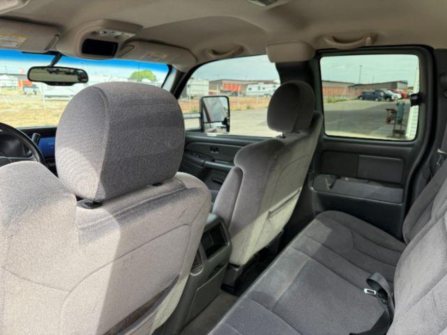 2005 RED /Dark Pewter GMC Sierra 2500HD (1GTHK29295E) with an 66 engine, Automatic transmission, located at 1175 N Woodruff Ave, Idaho Falls, ID, 83401, 43.506901, -111.999657 - At Timberline Auto, finding a great deal on your next vehicle is always easy! Our experienced sales staff's goal is to help find you the right vehicle at the right price! Our knowledgeable finance department has options for almost any credit score. We offer extended service contract options to prote - Photo#36