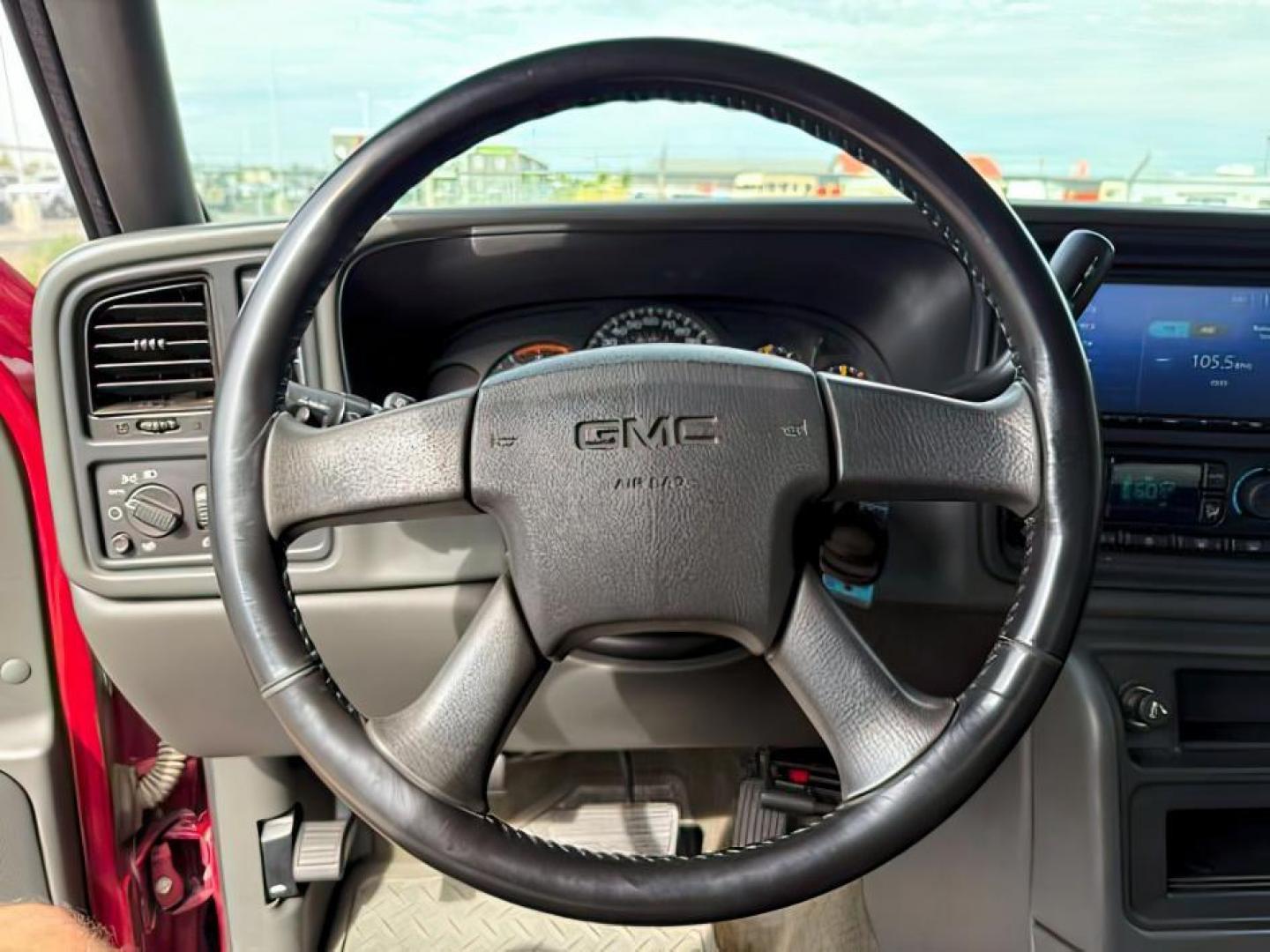 2005 RED /Dark Pewter GMC Sierra 2500HD (1GTHK29295E) with an 66 engine, Automatic transmission, located at 1175 N Woodruff Ave, Idaho Falls, ID, 83401, 43.506901, -111.999657 - At Timberline Auto, finding a great deal on your next vehicle is always easy! Our experienced sales staff's goal is to help find you the right vehicle at the right price! Our knowledgeable finance department has options for almost any credit score. We offer extended service contract options to prote - Photo#12