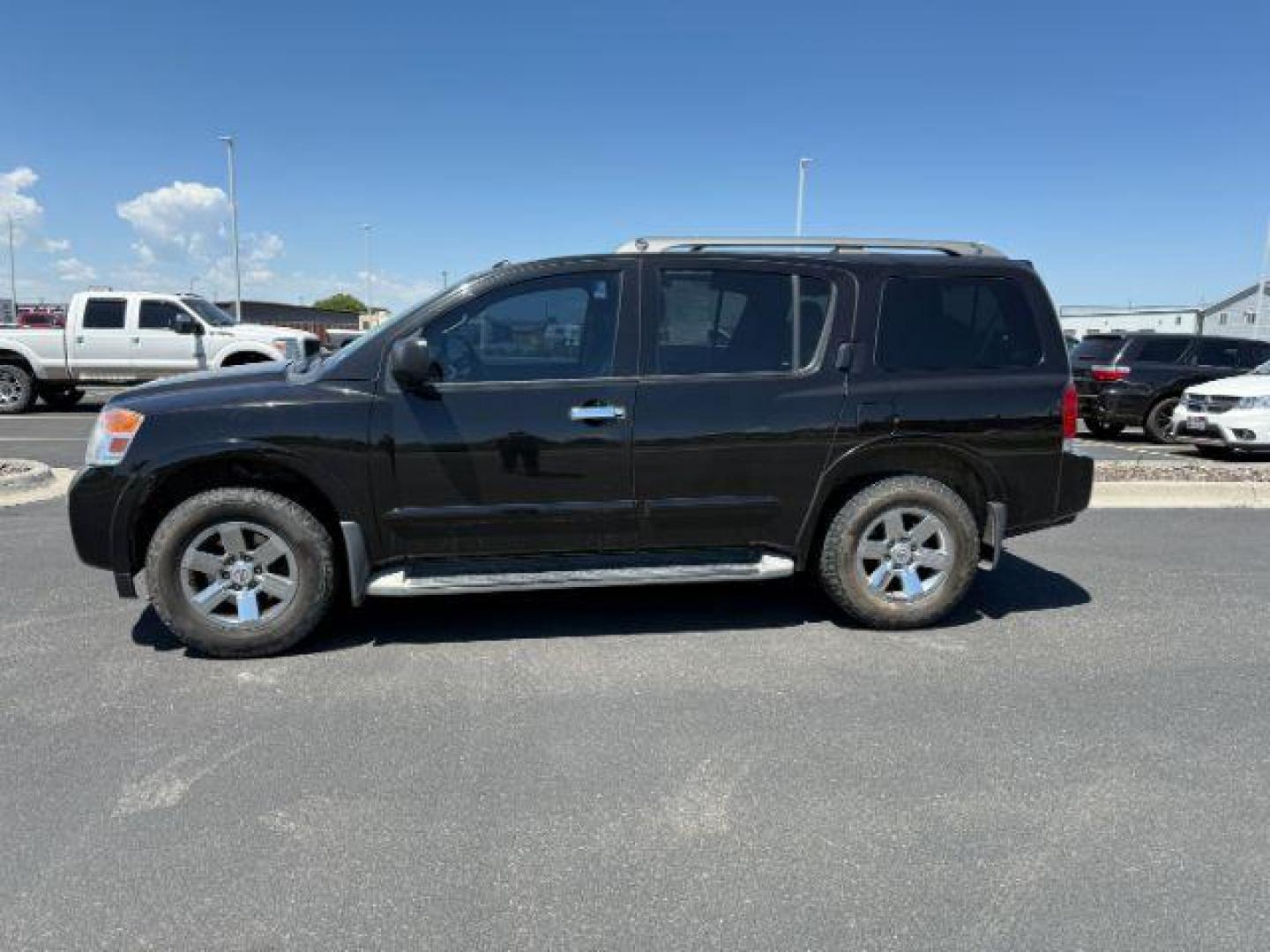 2014 Galaxy Black /Charcoal Nissan Armada SV (5N1AA0NCXEN) with an Endurance 5.6L V-8 DOHC engine, AUTOMATIC transmission, located at 1235 N Woodruff Ave., Idaho Falls, 83401, (208) 523-1053, 43.507172, -112.000488 - At Timberline Auto, finding a great deal on your next vehicle is always easy! Our experienced sales staff's goal is to help find you the right vehicle at the right price! Our knowledgeable finance department has options for almost any credit score. We offer extended service contract options to prote - Photo#0