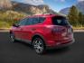2016 Barcelona Red Metallic /Black Toyota RAV4 (2T3BFREV2GW) with an 25L I-4 DOHC engine, Automatic transmission, located at 1175 N Woodruff Ave, Idaho Falls, ID, 83401, 43.506901, -111.999657 - At Timberline Auto, finding a great deal on your next vehicle is always easy! Our experienced sales staff's goal is to help find you the right vehicle at the right price! Our knowledgeable finance department has options for almost any credit score. We offer extended service contract options to prote - Photo#2