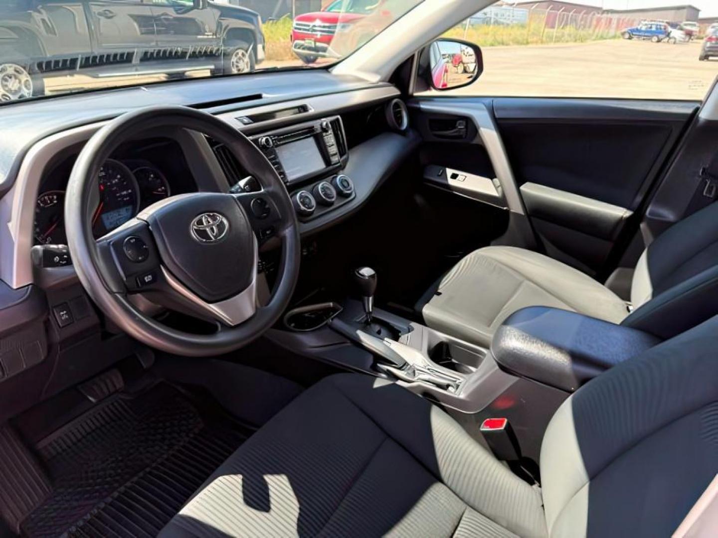 2016 Barcelona Red Metallic /Black Toyota RAV4 (2T3BFREV2GW) with an 25L I-4 DOHC engine, Automatic transmission, located at 1175 N Woodruff Ave, Idaho Falls, ID, 83401, 43.506901, -111.999657 - At Timberline Auto, finding a great deal on your next vehicle is always easy! Our experienced sales staff's goal is to help find you the right vehicle at the right price! Our knowledgeable finance department has options for almost any credit score. We offer extended service contract options to prote - Photo#12